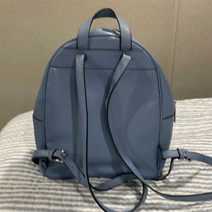 I am selling a brand new Michael Kors pack back.